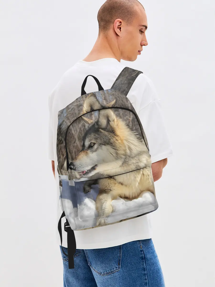 Рюкзак джинсовый / Волк лежит на снегу