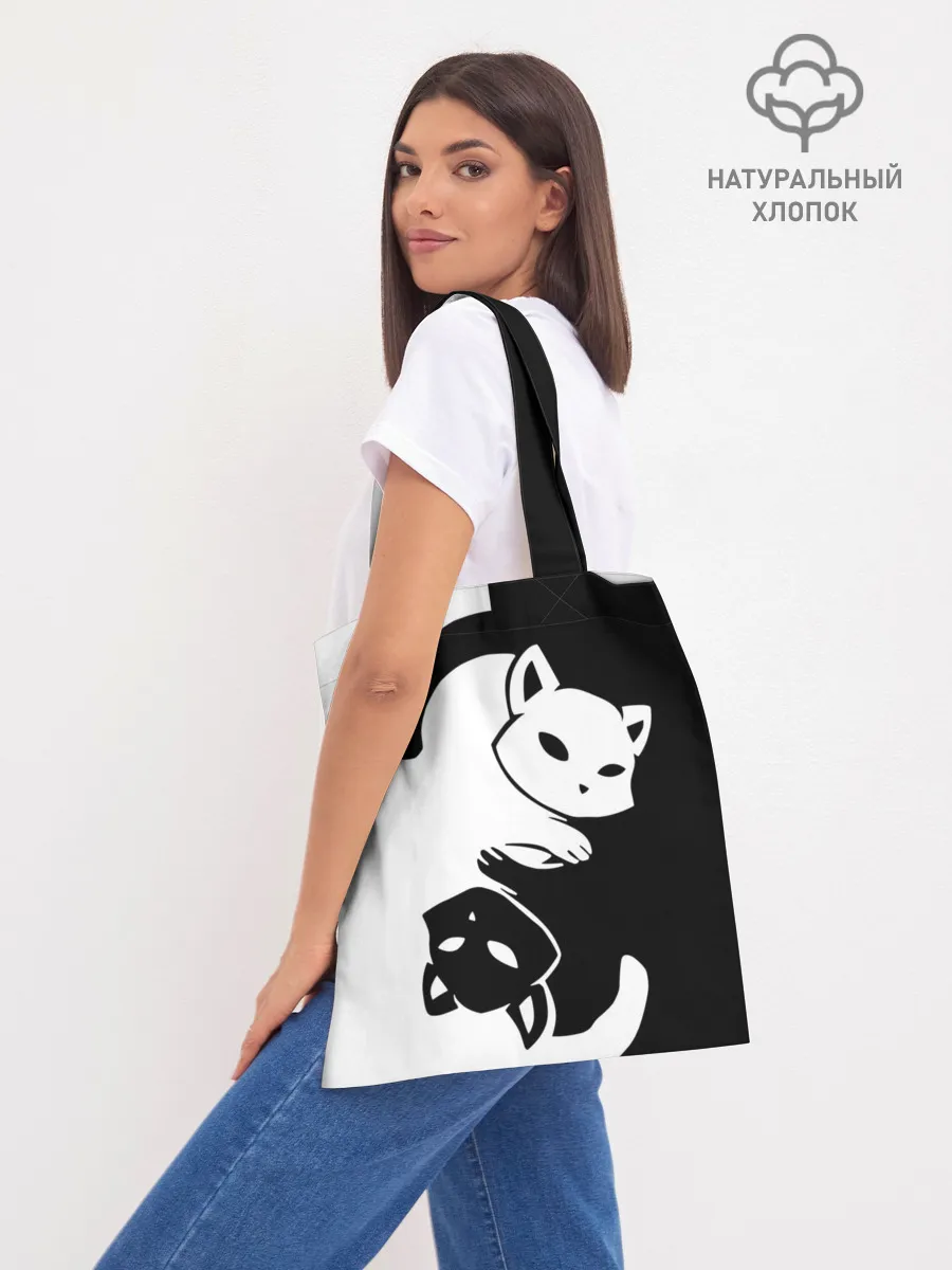 Шоппер база / Черный и белый кот кувыркаются.